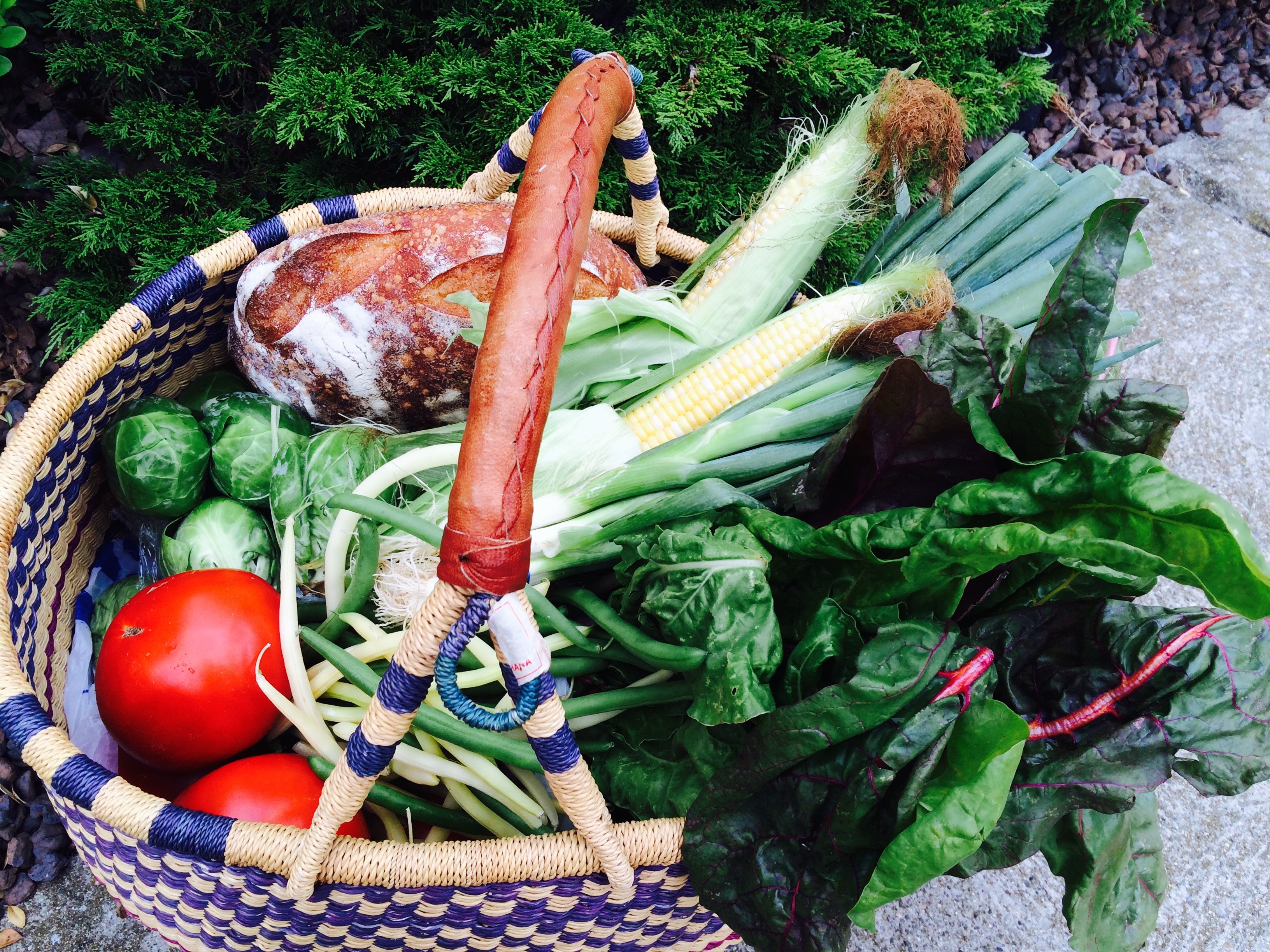 Fresh basket of vegetables and bread